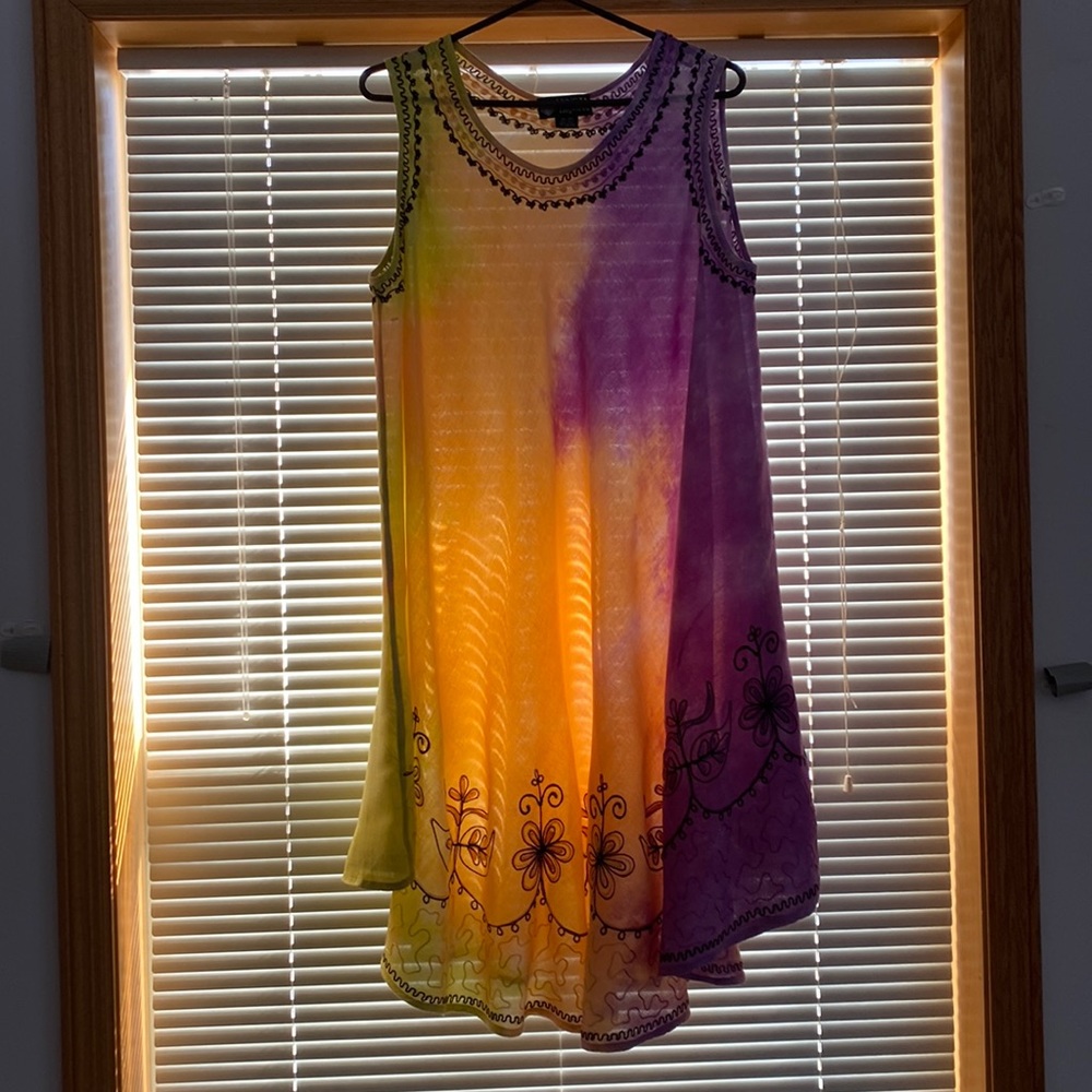 Tie-dye swimsuit cover-up. Never worn.